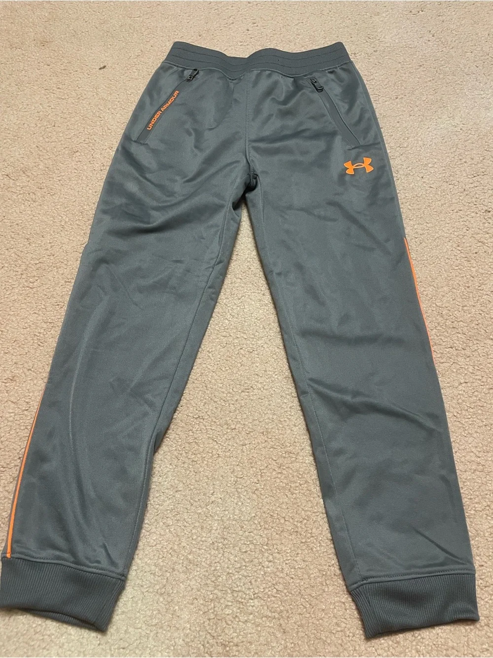 Under Armour Boys' Gray Jogger Pants with Orange Accents( size: 7)